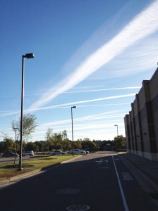 Monday, October 20, 2014, 8:40 a.m. taken beside Fresh Market on International Drive looking east across Military Cutoff Road in Wilmington, North Carolina. Note how the lines of contrails have spread out and blended together. Photo by author
